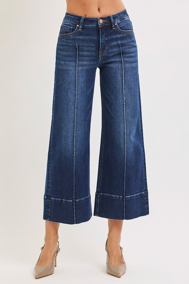 Deep blue Pintuck Tummy Control Wide Leg Cropped Jeans with wide hem by Risen, featuring a high waist and relaxed fit.