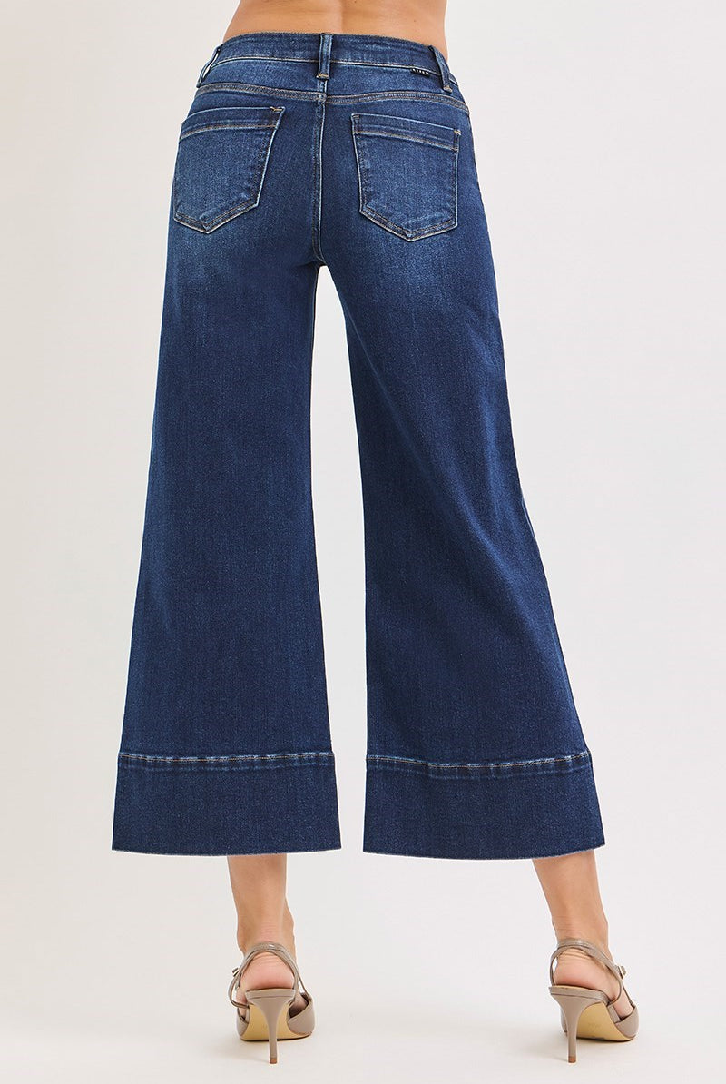 Deep blue pintuck tummy control wide-leg cropped jeans with wide hem by RARA Boutique, showcasing the relaxed fit and stylish design.