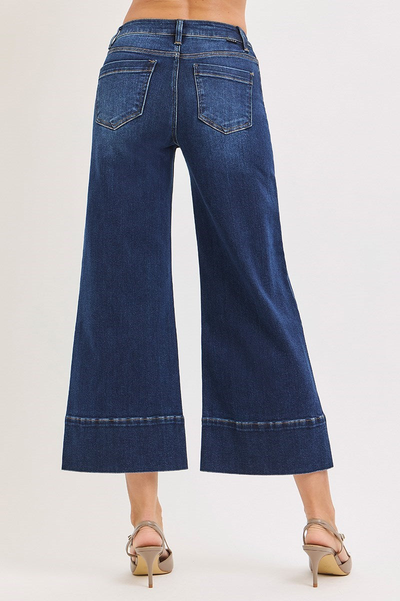 Deep blue pintuck tummy control wide-leg cropped jeans with wide hem by RARA Boutique, showcasing the relaxed fit and stylish design.