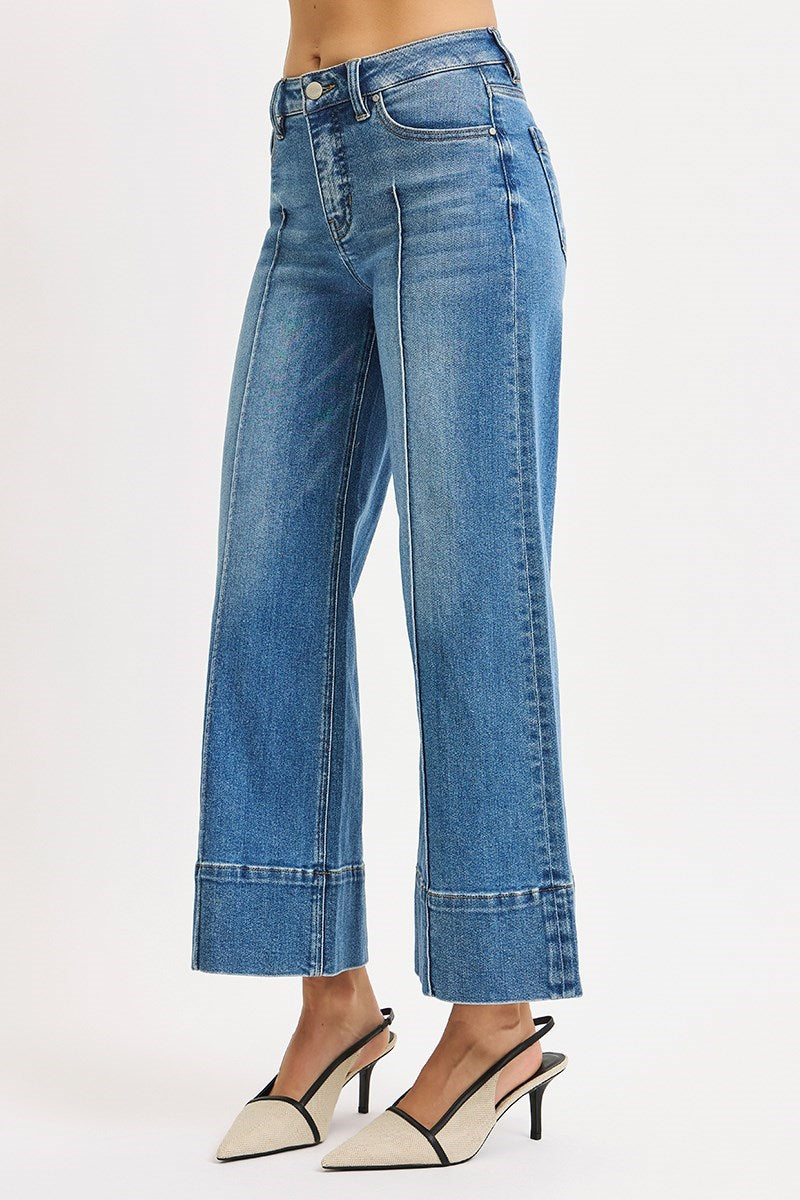 Medium rinse Pintuck Tummy Control Wide Leg Cropped Jeans with wide hem from RARA Boutique, showing the relaxed fit and stylish design.