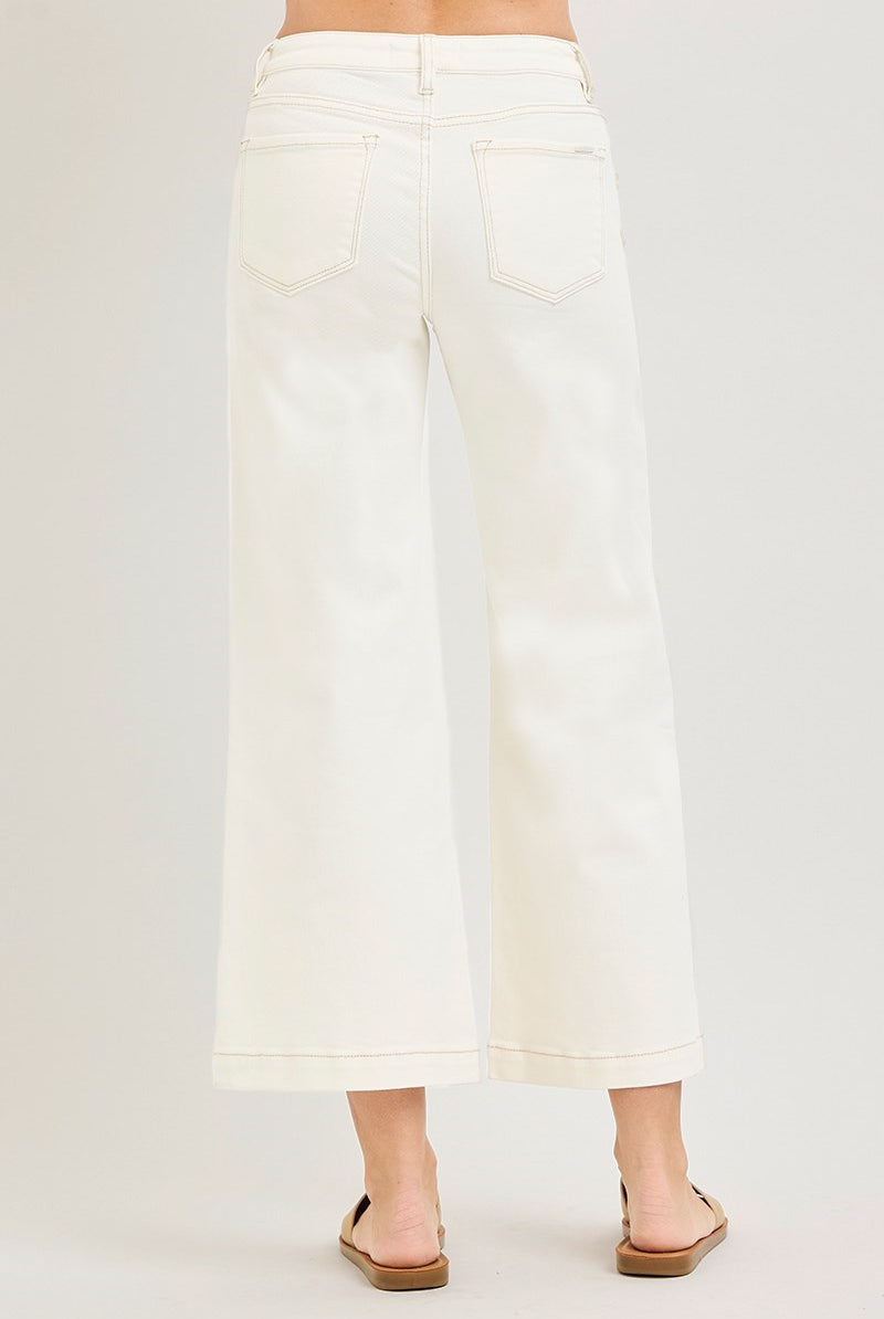 Cream wide-leg cropped jeans by Risen with 3D flower and pearl embellishments, featuring a relaxed fit and stylish design.