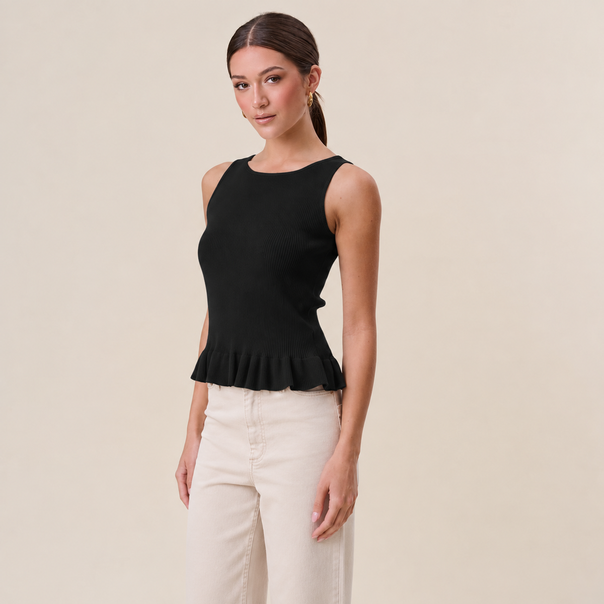 Able Tuesday Top AT3189 ruffle rib-knit tank top with a fitted style and ruffled neckline, shown in ribbed fabric.