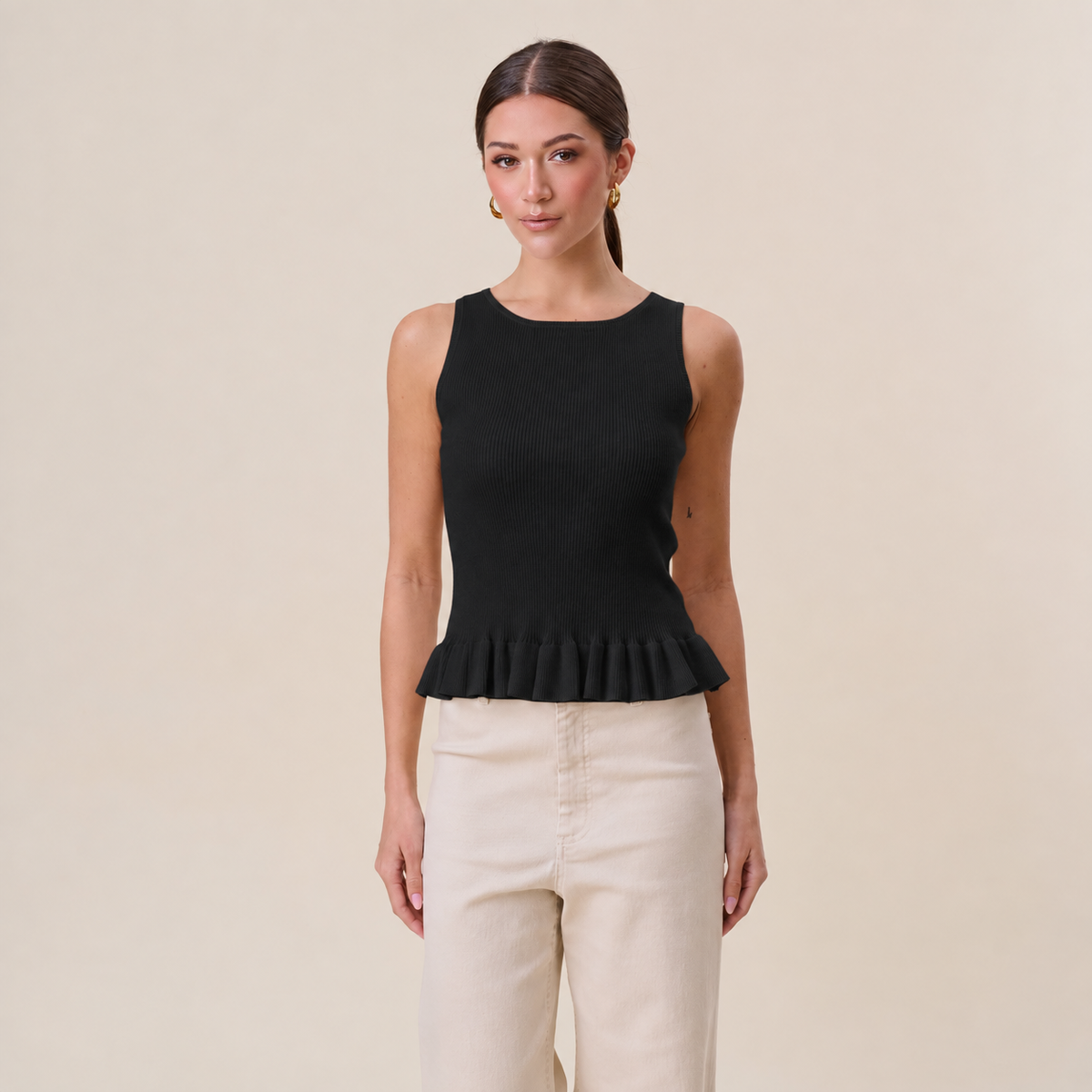 Able Tuesday Top AT3189 ruffle rib-knit tank top with gathered ruffle details and fitted ribbed fabric.