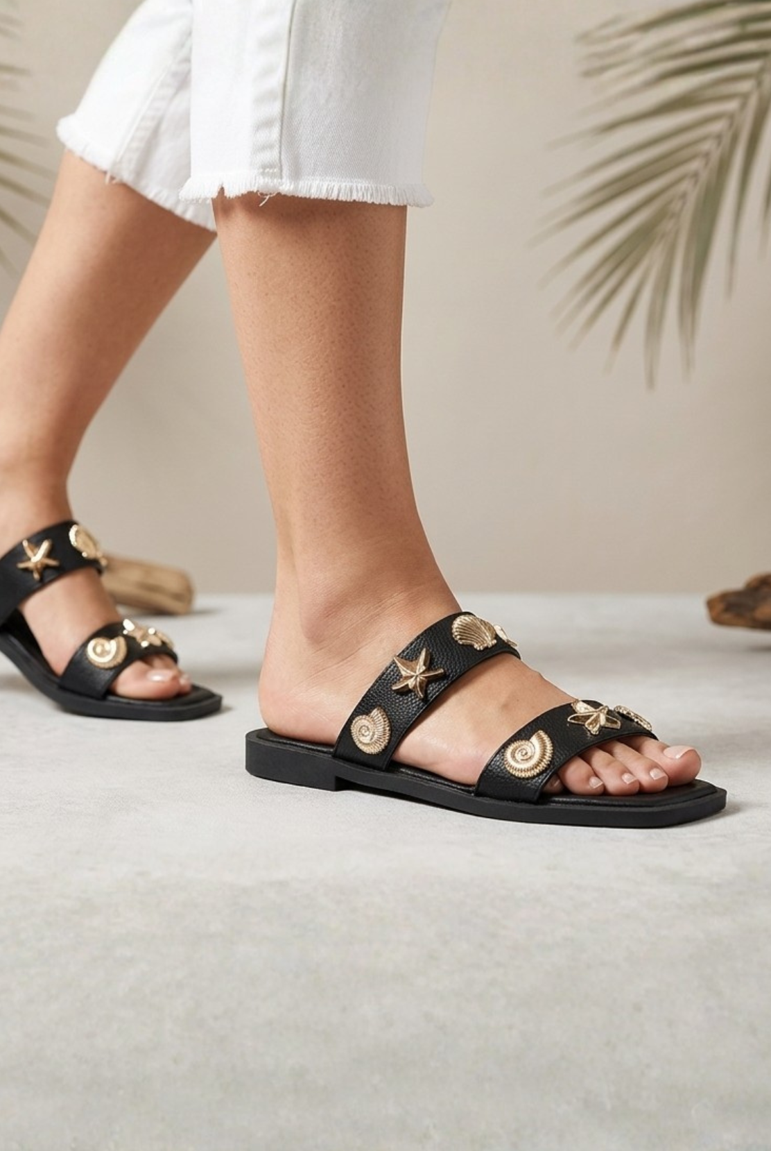 RARA Boutique nautical seashell charm double strap slide sandals, stylish beach-ready footwear with seashell accents.