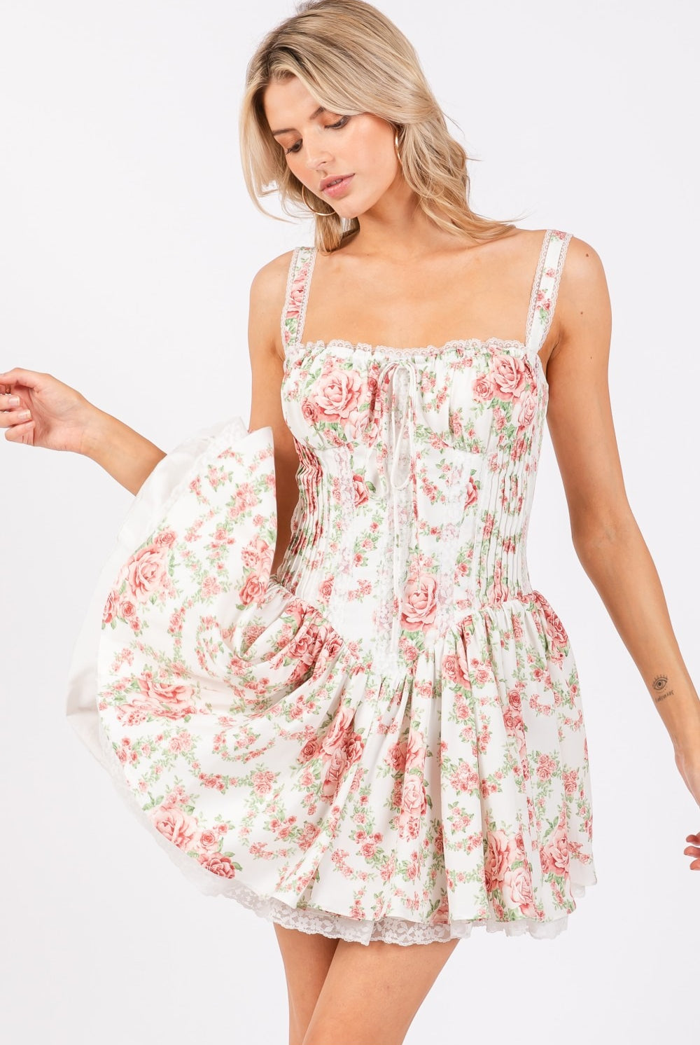 Ivory pink floral corset drop-waist A-line mini dress by RARA Boutique, featuring a fitted bodice and flared skirt.