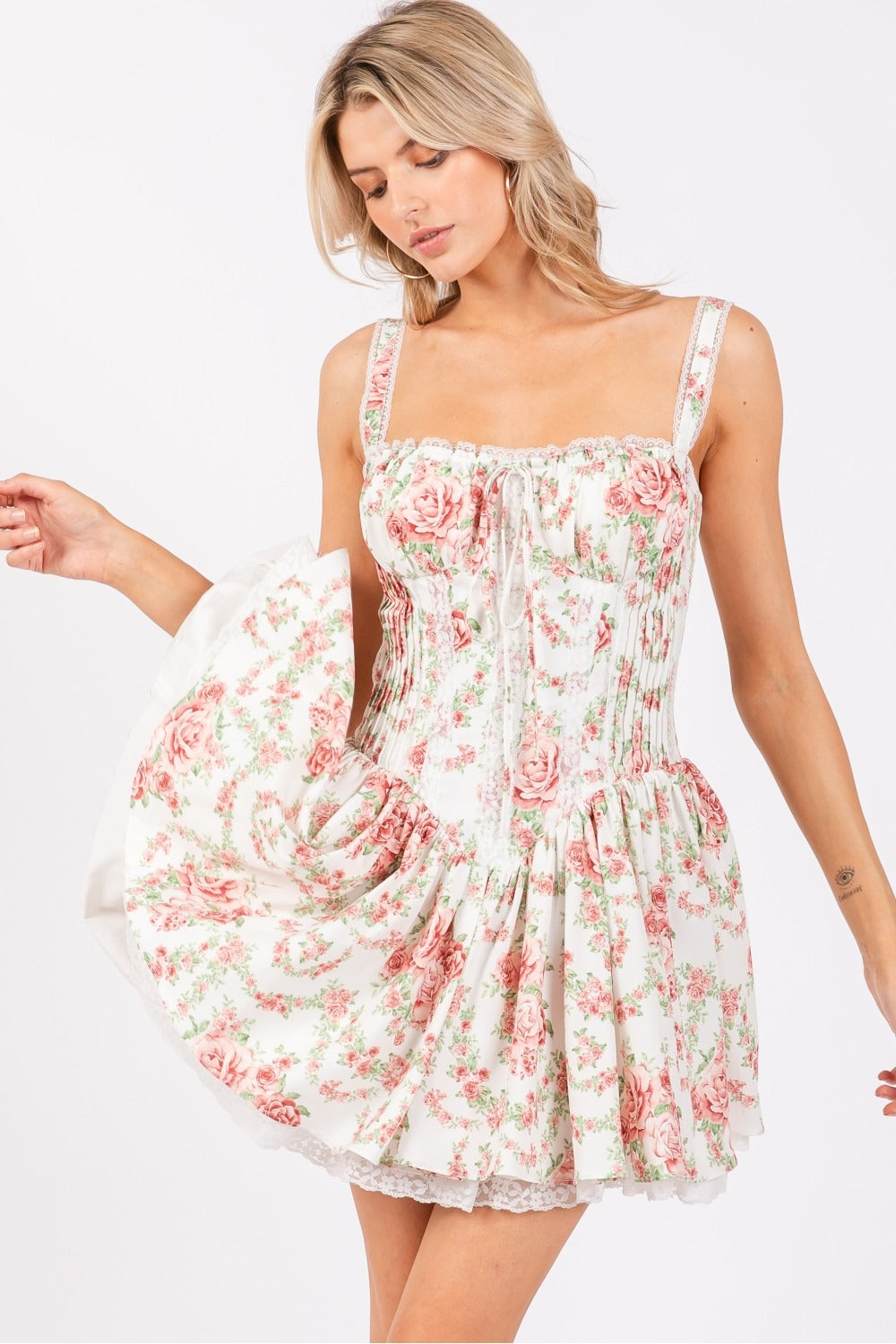 Ivory pink floral corset drop-waist A-line mini dress by RARA Boutique, featuring a fitted bodice and flared skirt.