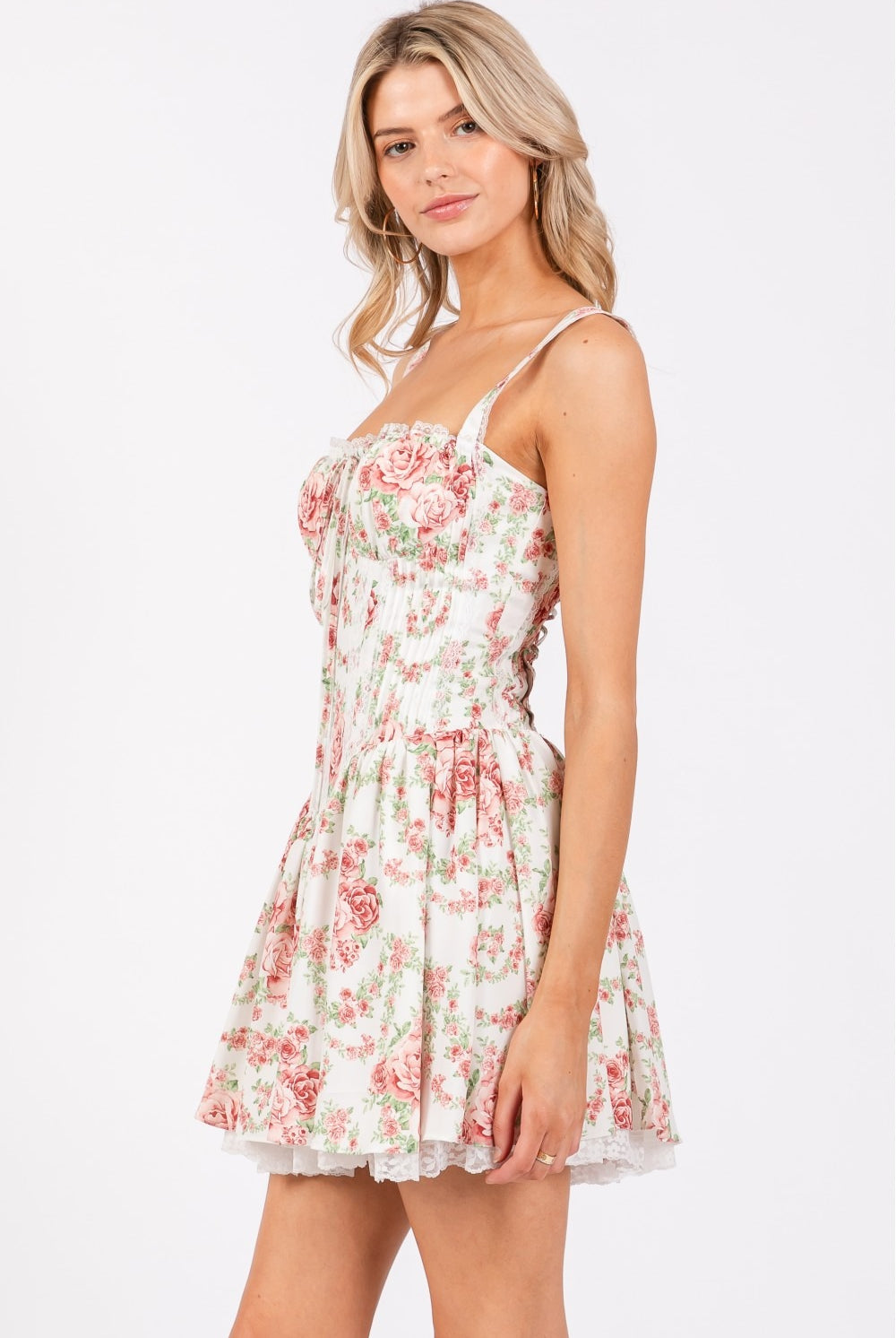 Ivory pink floral corset drop-waist A-line mini dress by RARA Boutique, featuring a fitted bodice and feminine floral pattern.