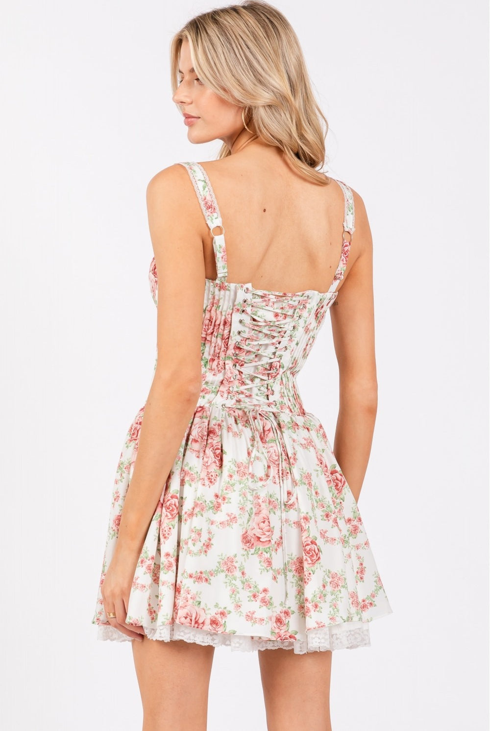 Ivory pink floral corset drop-waist A-line mini dress by RARA Boutique, featuring a fitted bodice and flared skirt.