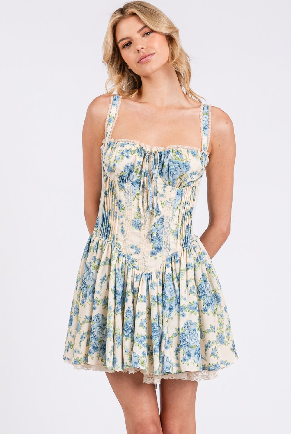 Floral corset drop-waist A-line mini dress from RARA Boutique, featuring a fitted bodice and flowy skirt with vibrant floral patterns.