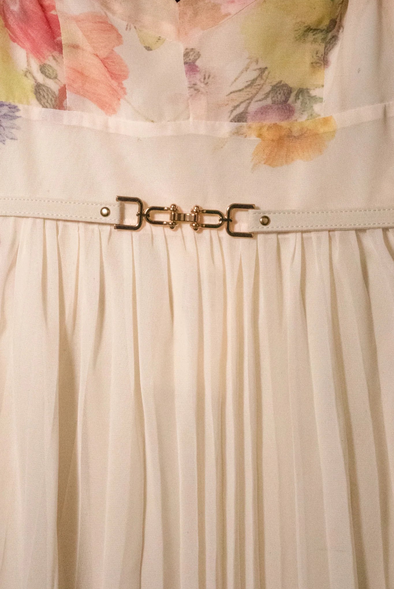 Watercolor floral butterfly print pleated midi dress with belt from RARA Boutique, in soft peach tones.
