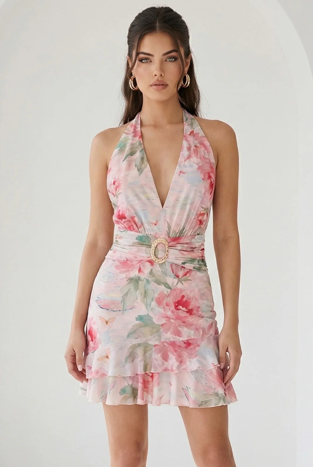 Watercolor floral ruffle halter mini dress in peach by RARA Boutique, featuring soft fabric and feminine ruffle details.