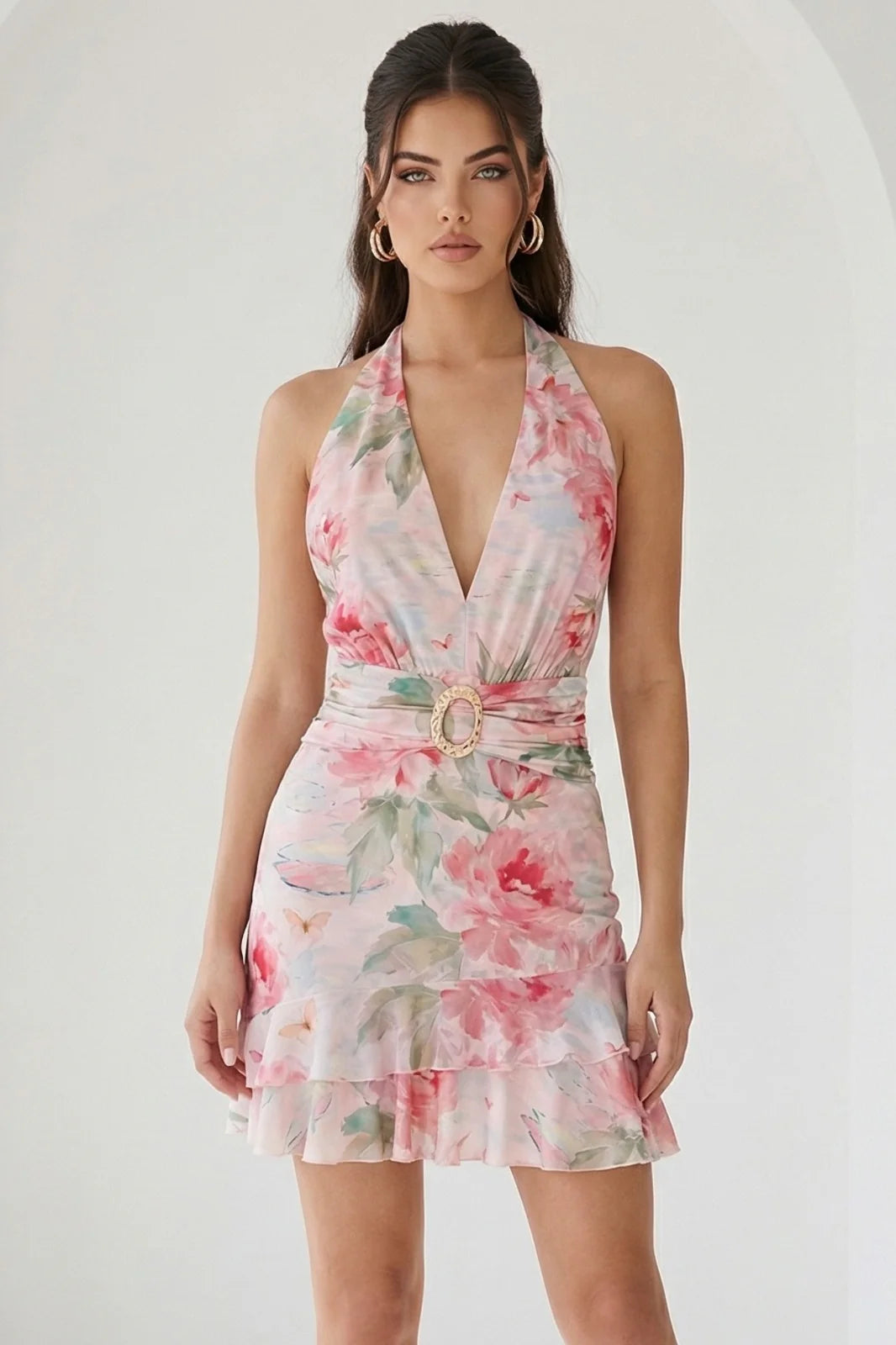 Watercolor floral ruffle halter mini dress in peach by RARA Boutique, featuring soft fabric and feminine ruffle details.