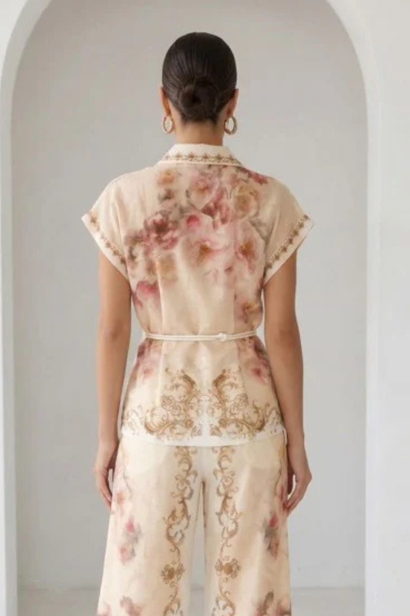 Peach watercolor floral baroque border blouse with button-down front and matching belt from RARA Boutique.