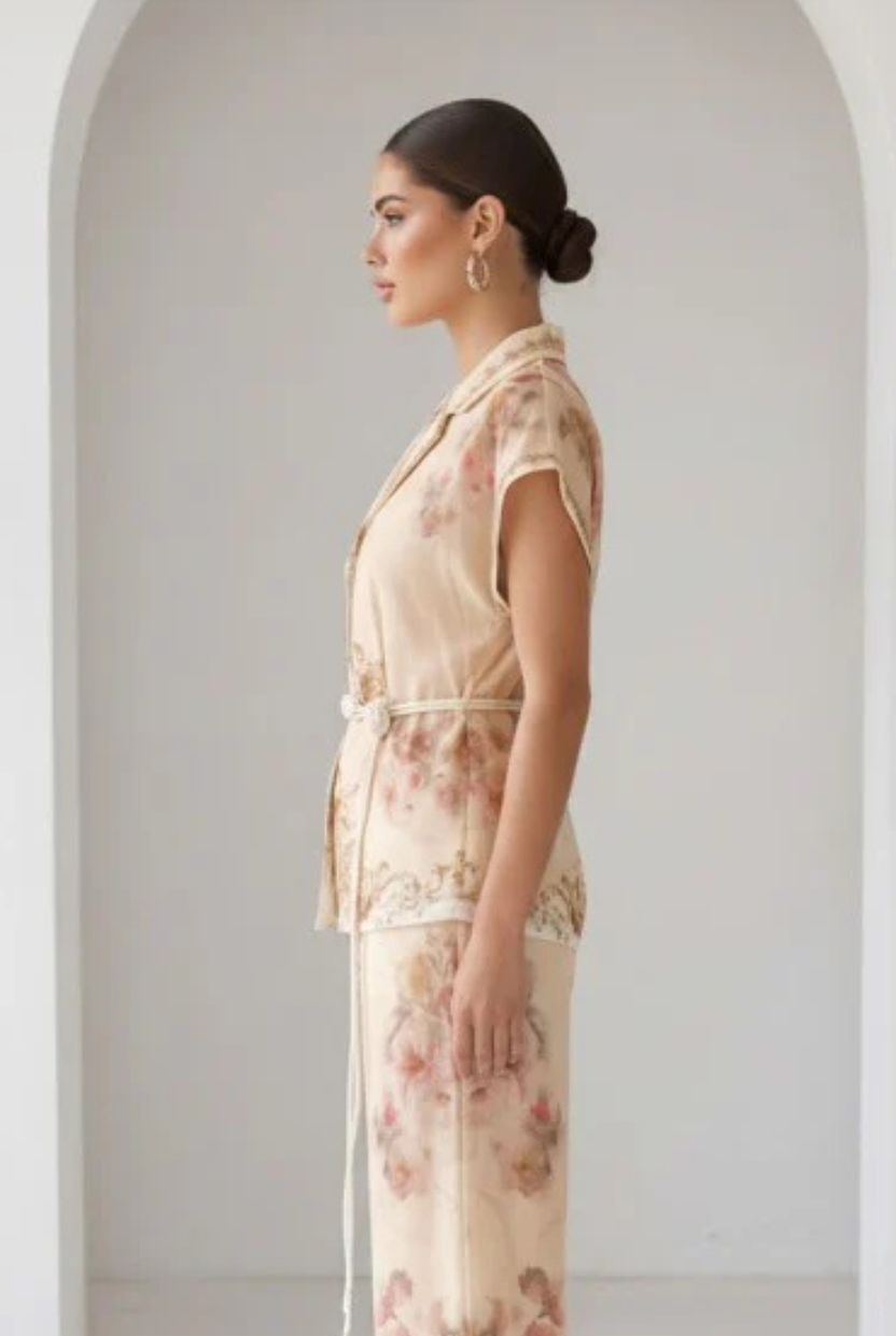 Peach watercolor floral baroque border blouse with button-down front and matching belt from RARA Boutique.