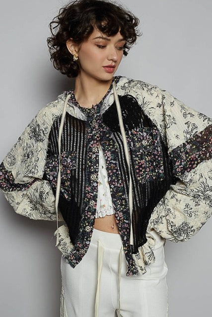 Balloon sleeve floral crochet and gauze jacket by RARA Boutique, featuring contrasting design and lightweight fabric.