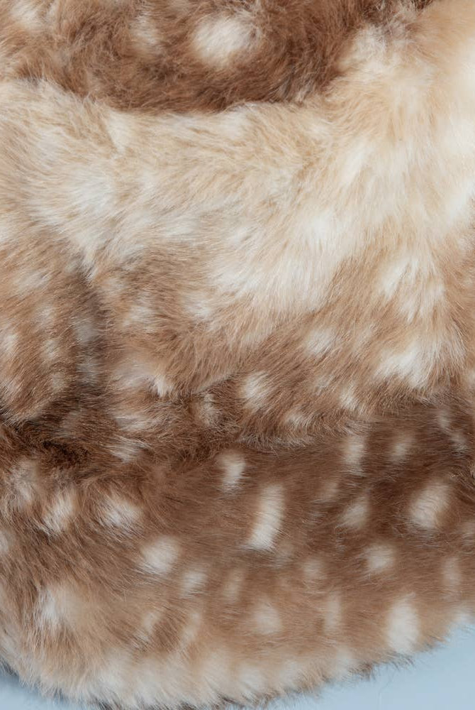 Spotted plush fawn fur bucket hat from Collections by Fame Accessories, featuring soft, textured animal print fabric.