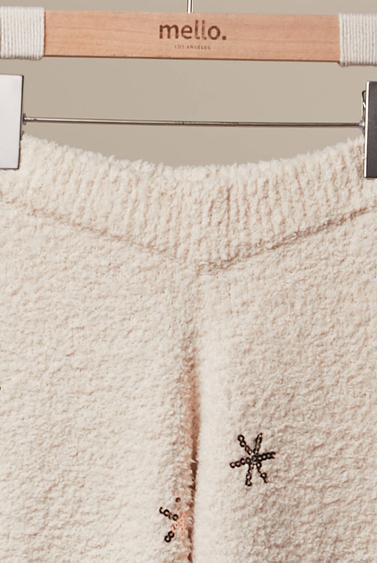 Mello Christmas tree sweater pants featuring festive holiday patterns, cozy knit fabric, and a comfortable fit.