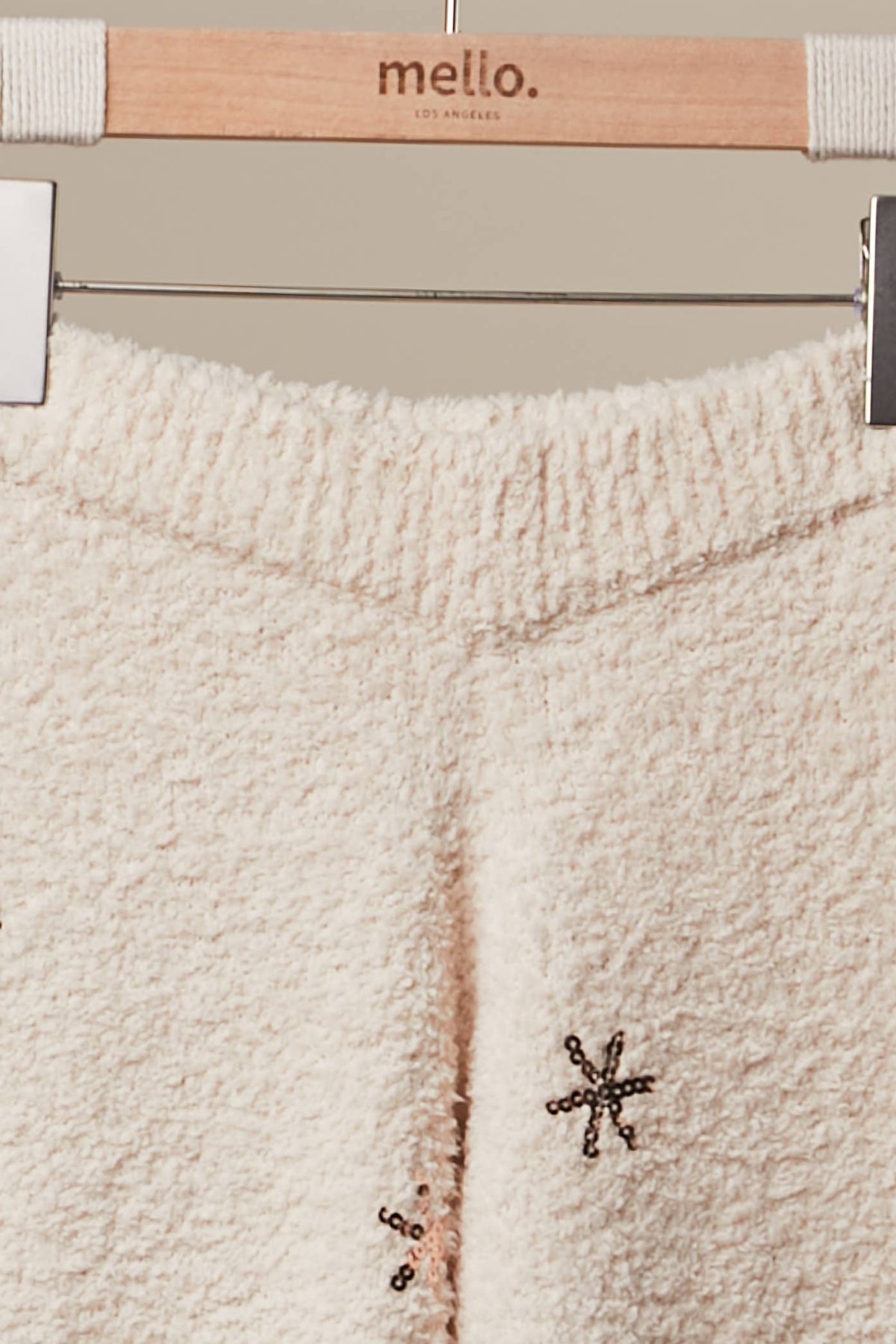 Mello Christmas tree sweater pants featuring festive holiday patterns, cozy knit fabric, and a comfortable fit.