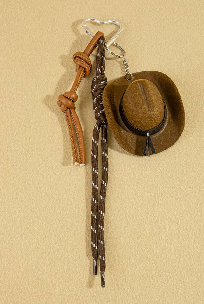 Mini cowboy hat Western rope bag charm with rustic design, featuring a small hat and rope detail for accessories.