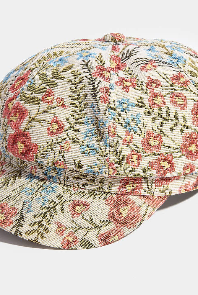 Floral tapestry newsboy cabbie hat by Collections by Fame Accessories, featuring a vintage-inspired floral fabric and classic newsboy design.