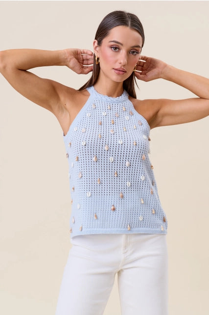 RARA Boutique seashell embellished open-knit halter tank top with a stylish, breathable design and shell details on the fabric.