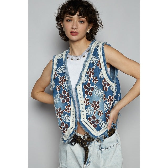 Embroidered floral frayed hem denim vest by RARA Boutique with intricate floral embroidery and distressed frayed edges.