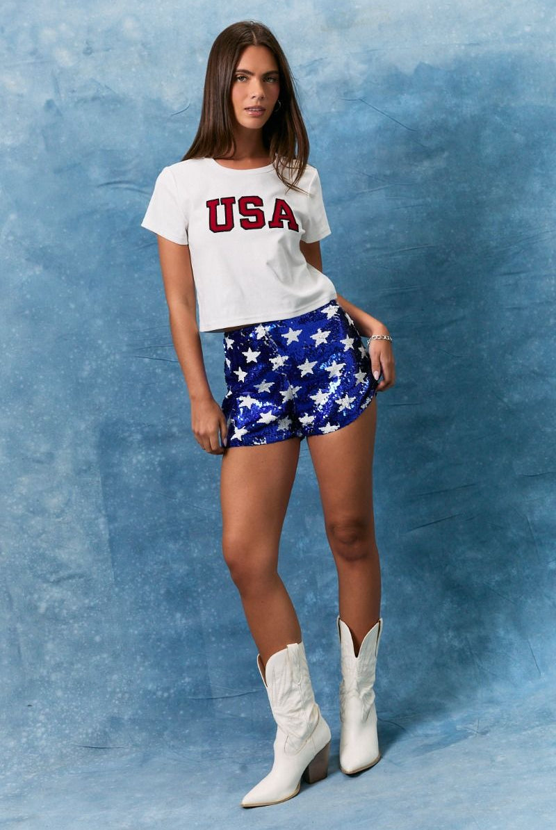 Blue and white sequin star pattern mid-rise shorts by RARA Boutique, featuring a stylish design and comfortable fit.