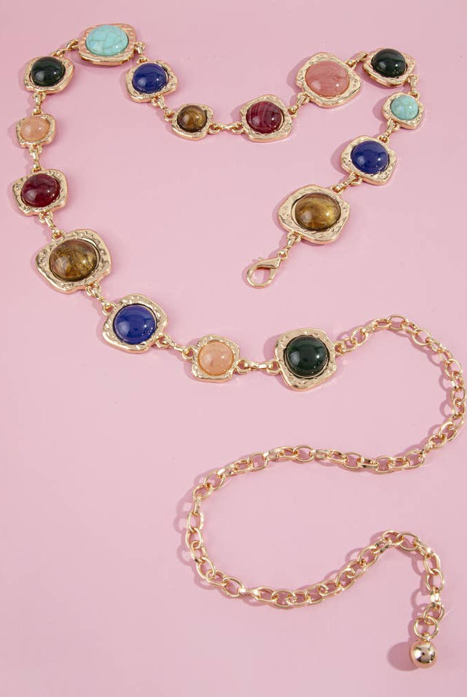 Gemstone cabochon station chain belt by Collections by Fame Accessories, featuring colorful polished stones along a sleek metal chain.