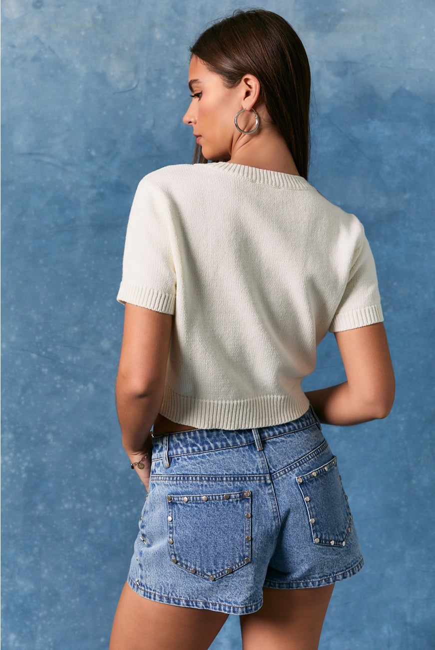 USA Dog graphic short-sleeve cropped sweater top by Le Lis, featuring a playful dog design on a lightweight knit sweater.