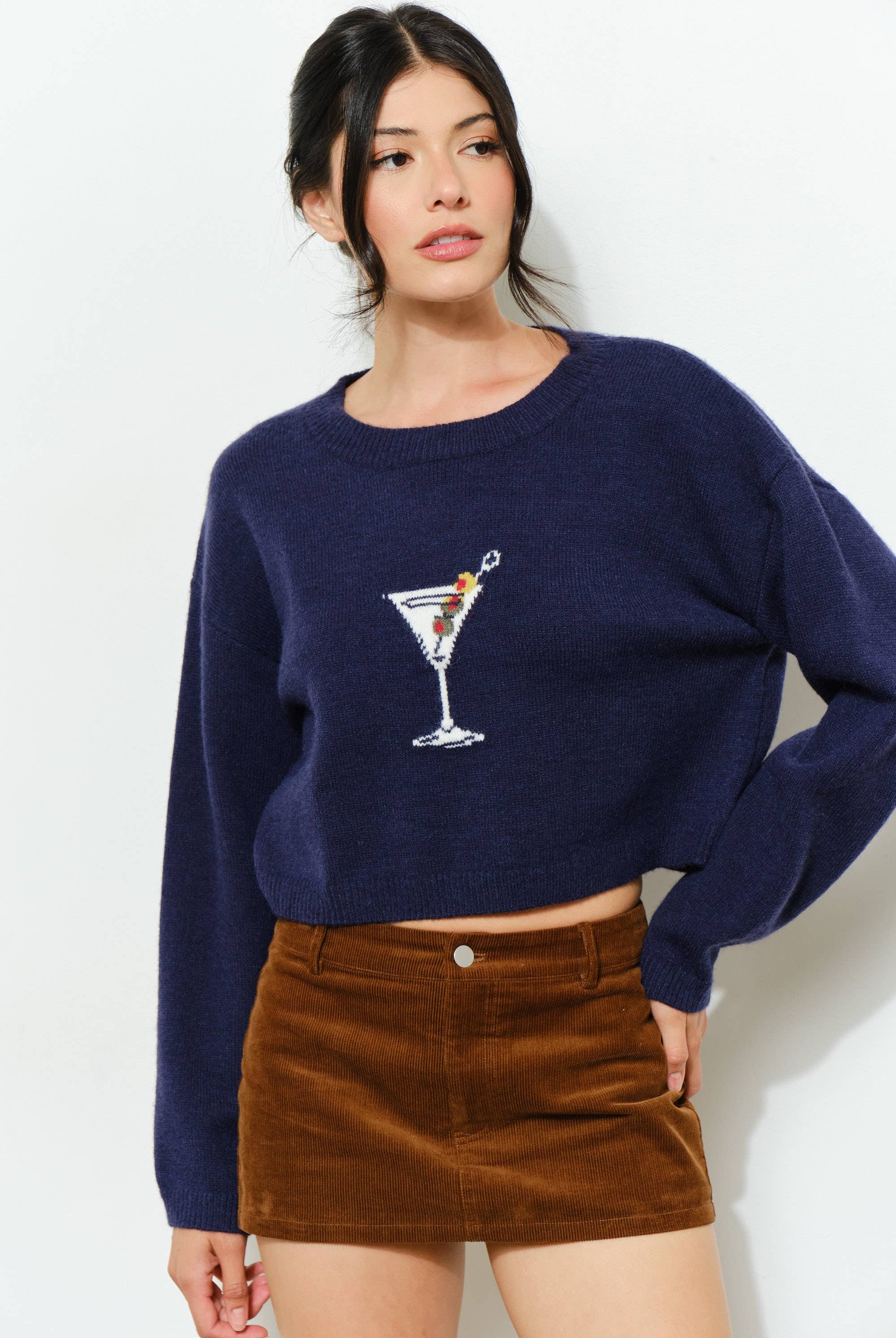 Pretty Garbage KAINA Martini Sweater in soft knit, featuring a relaxed fit and stylish design, displayed on a mannequin.