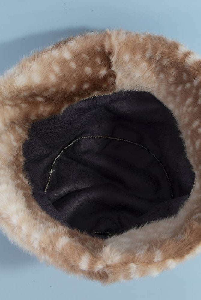Spotted plush fawn fur bucket hat by Collections by Fame Accessories showing soft, textured animal print fabric.
