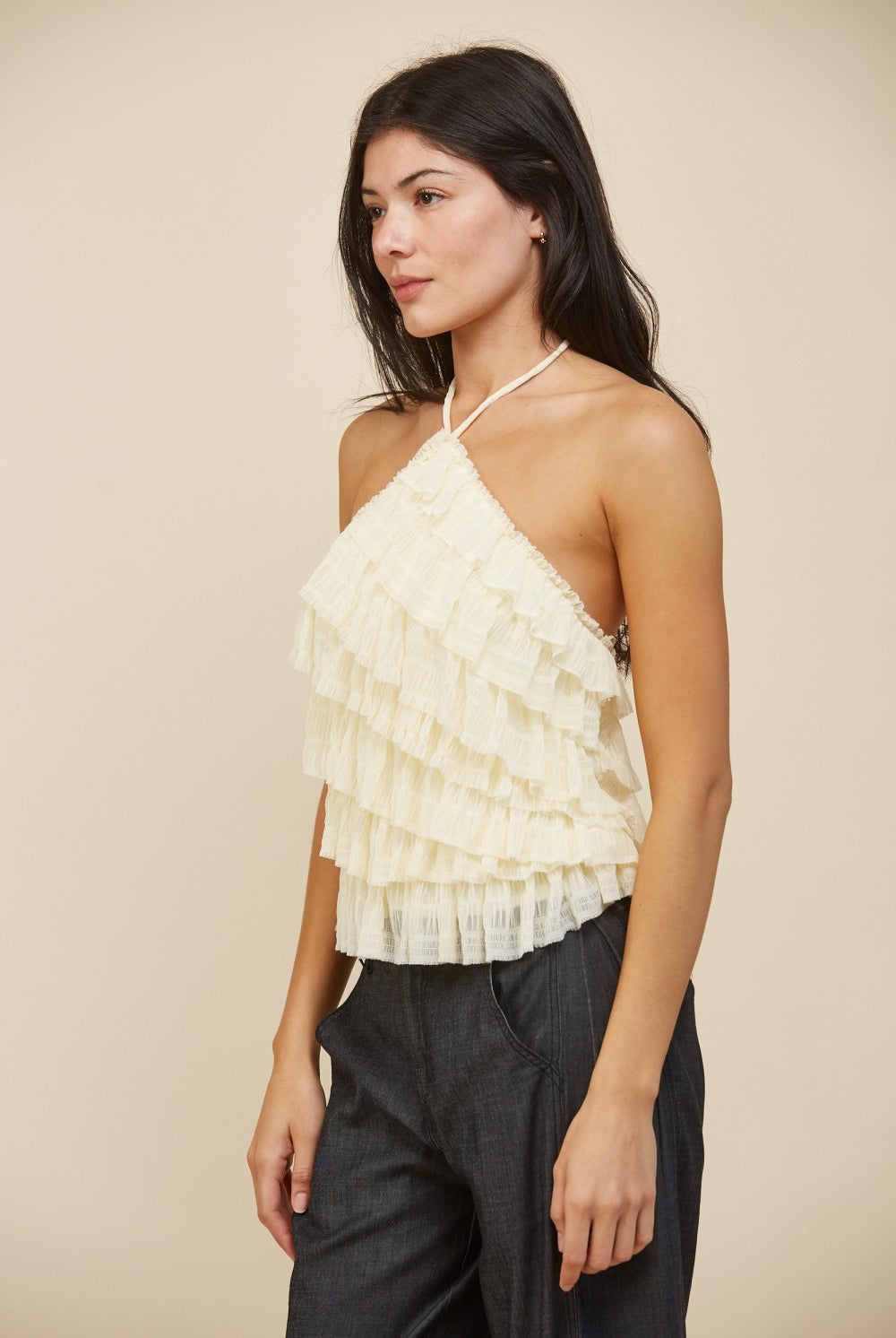 RARA Boutique tiered ruffle halter neck tank top with layered fabric and sleeveless design, styled on a mannequin.