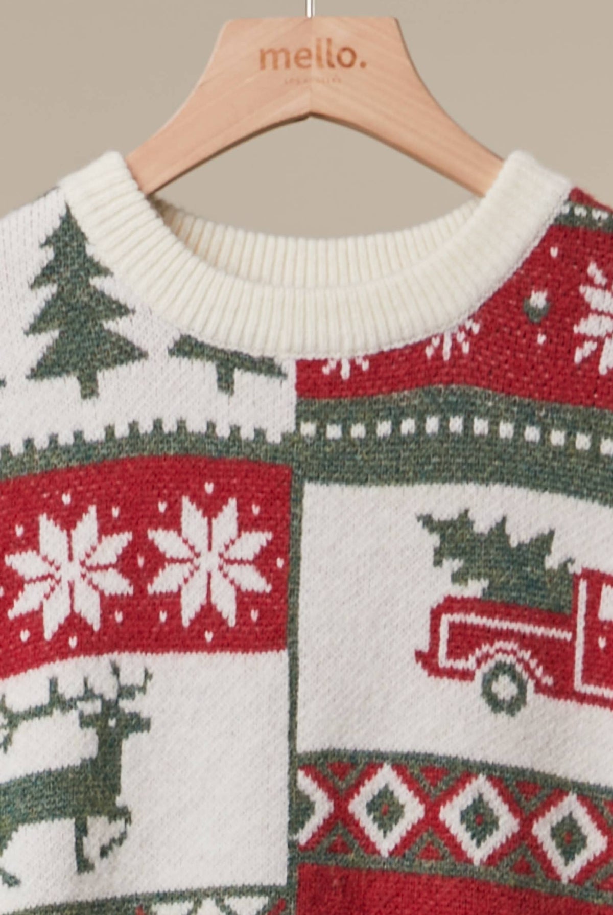 Mello Nordic Christmas knit sweater featuring festive pattern, cozy wool material, and holiday-themed design.