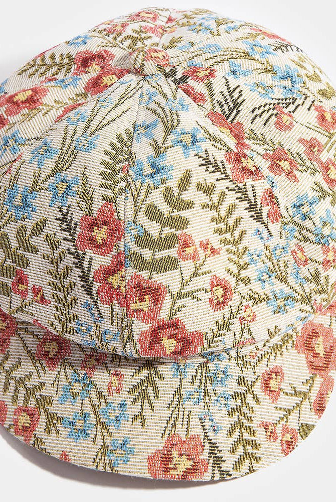 Floral tapestry newsboy cabbie hat by Collections by Fame Accessories with colorful floral pattern and classic newsboy style.
