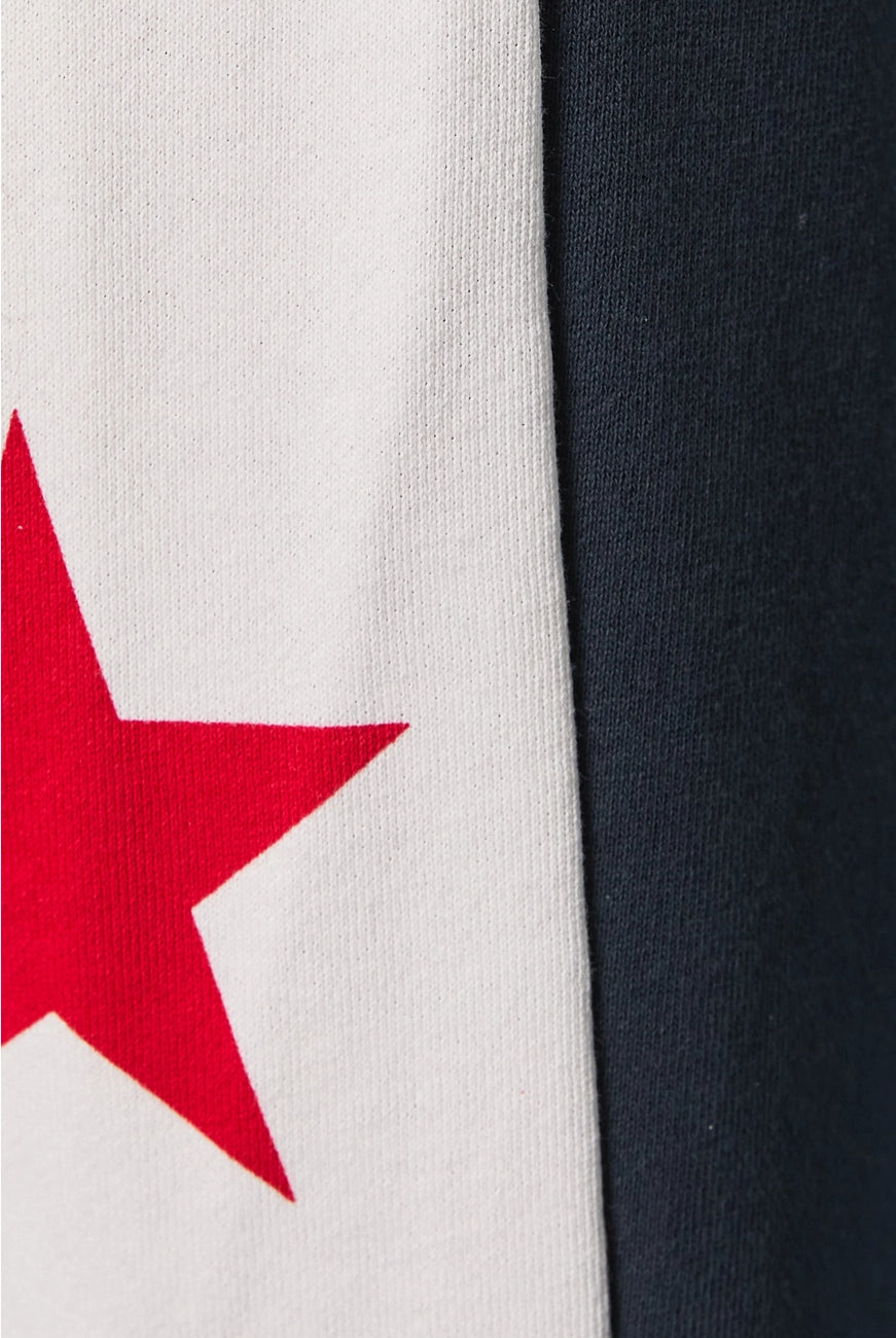 Le Lis Star Side Stripe Wide Leg Baggy Sweatpants from RARA Boutique featuring relaxed fit, star accents, and side stripe details.