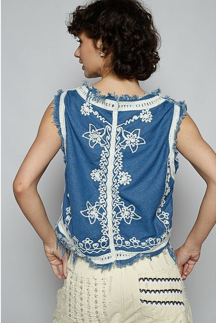Crochet floral V-neck denim vest by RARA Boutique featuring floral embroidery and a stylish V-neck design.