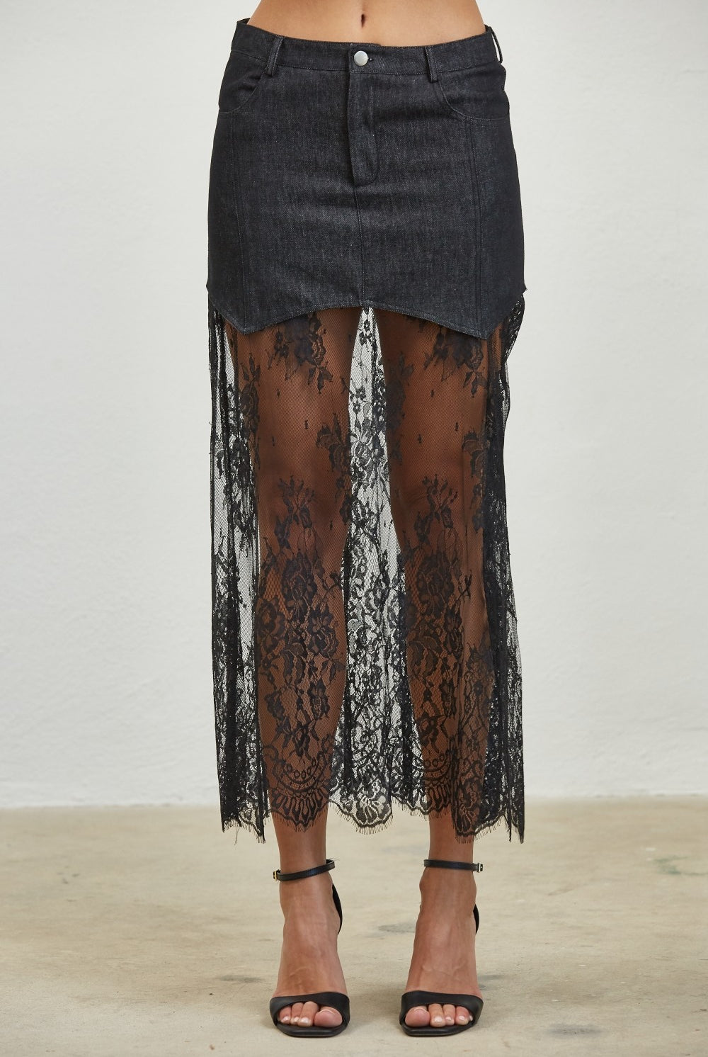 Layered denim lace contrast midi skirt by RARA Boutique, featuring a stylish design with textured fabric and intricate lace details.