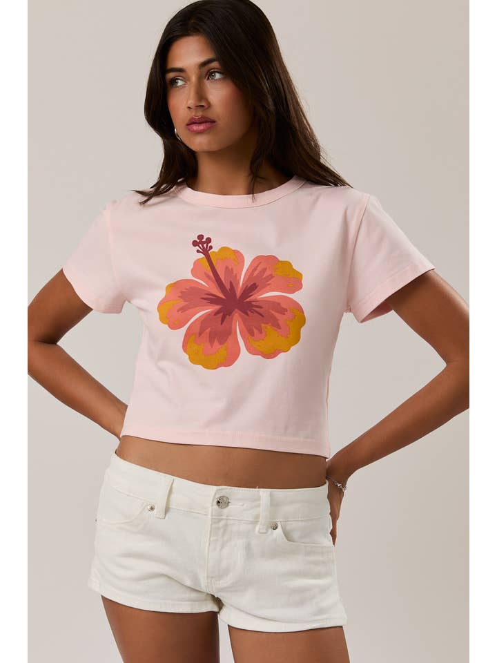 Bright hibiscus tropical flower print short sleeve cropped baby tee from RARA Boutique, featuring vibrant floral design and comfortable fit.