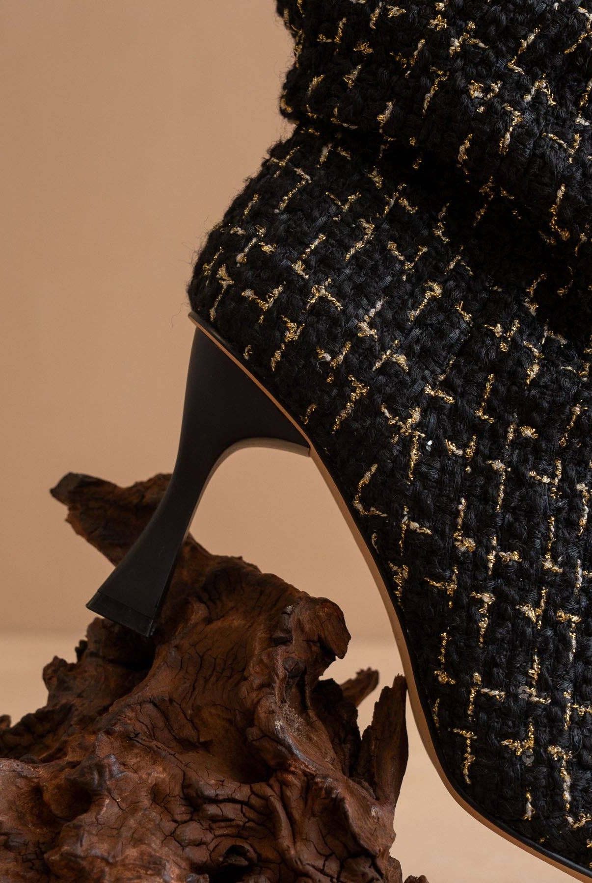 Black tweed slouch heel fall bootie with rounded toe and chunky heel, stylishly designed by Oasis Society.