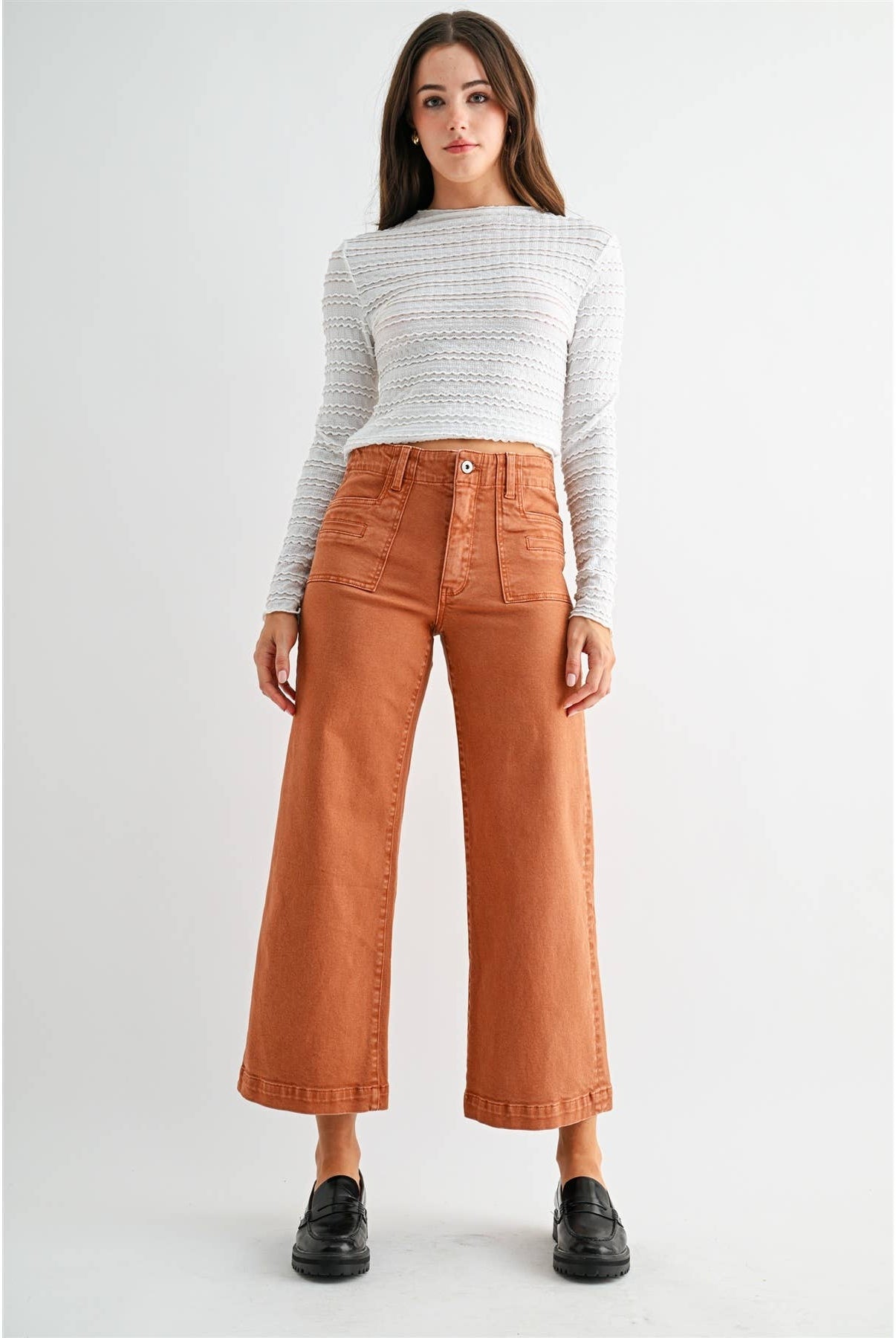 Mica Denim high-rise wide crop jeans with patch pockets and distressed details, styled with a casual, relaxed fit.