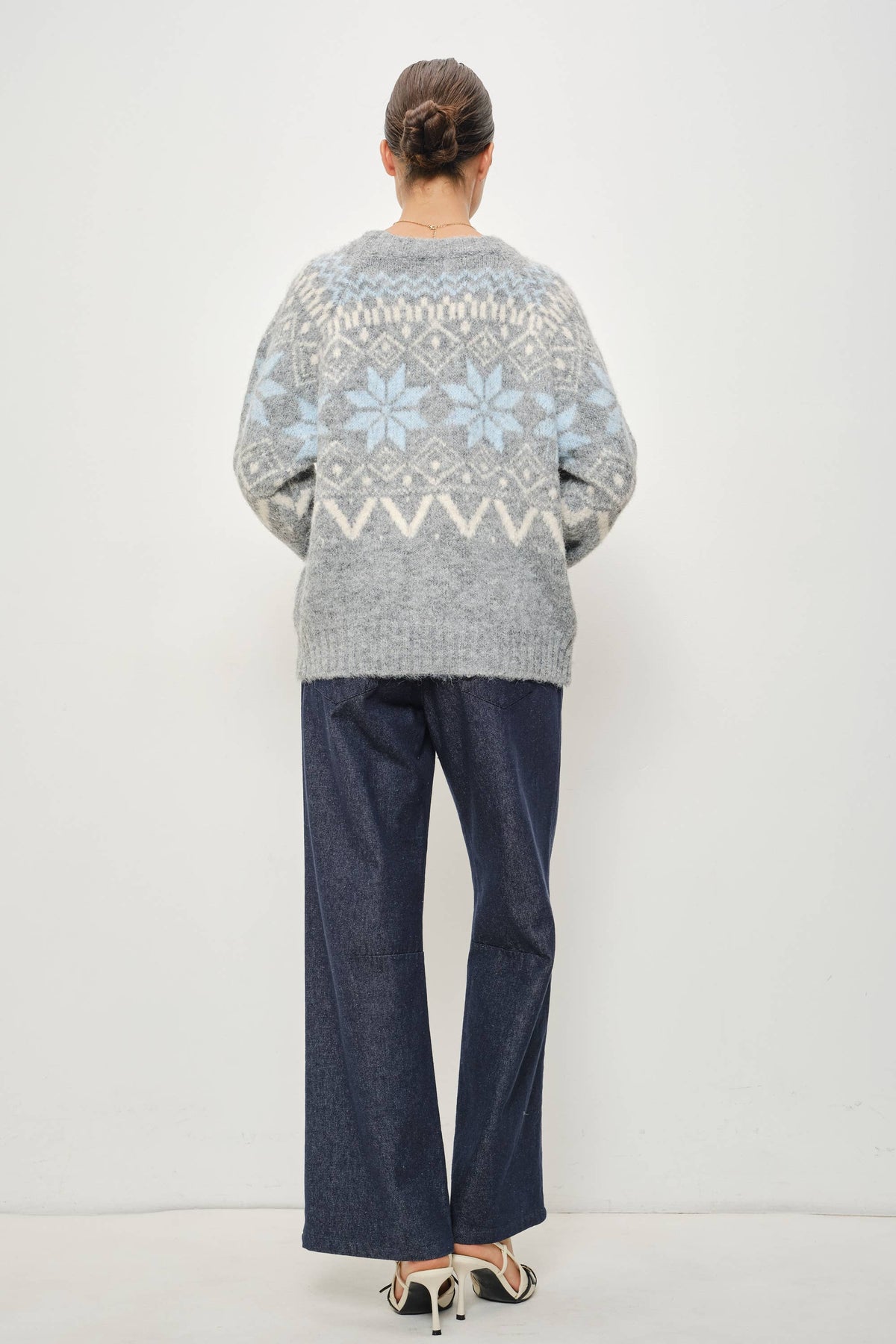 Pretty Garbage RIA Faire Isle crewneck knitted pullover with intricate fair isle pattern, soft wool blend, and ribbed cuffs and hem.