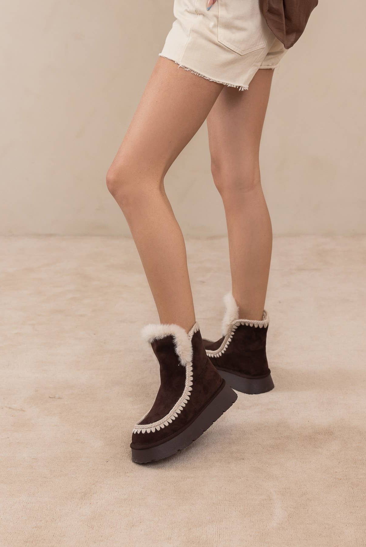 Oasis Society Joyce Coffee winter boot with shearling trim and platform sole, stylish and warm for cold weather wear.