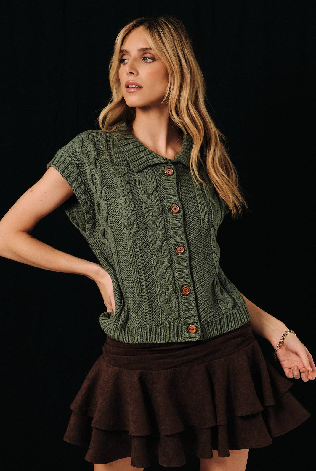Cable knit button-up sweater vest by Sunday Edition, featuring a classic knit pattern and button details.