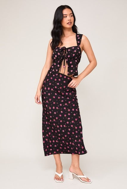 High waisted floral rose printed bias midi skirt by RARA Boutique, featuring colorful rose patterns and a flowy, elegant design.