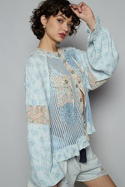 RARA Boutique balloon sleeve floral contrast crochet and gauze jacket with stylish design and lightweight fabric.