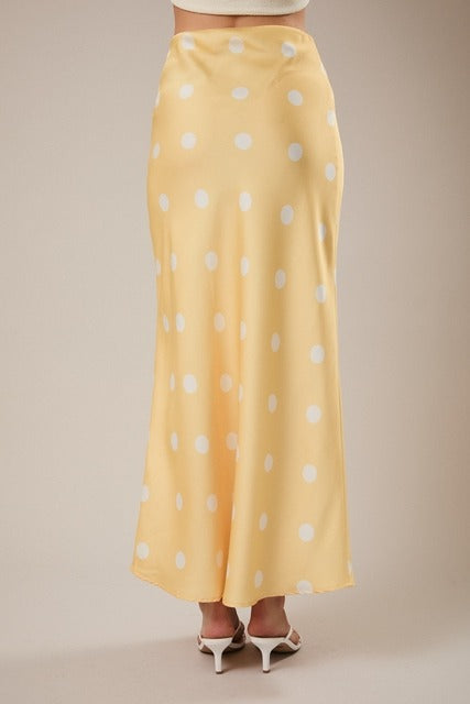 RARA Boutique polka dot satin maxi skirt with elastic waistband, flowing design and stylish pattern.
