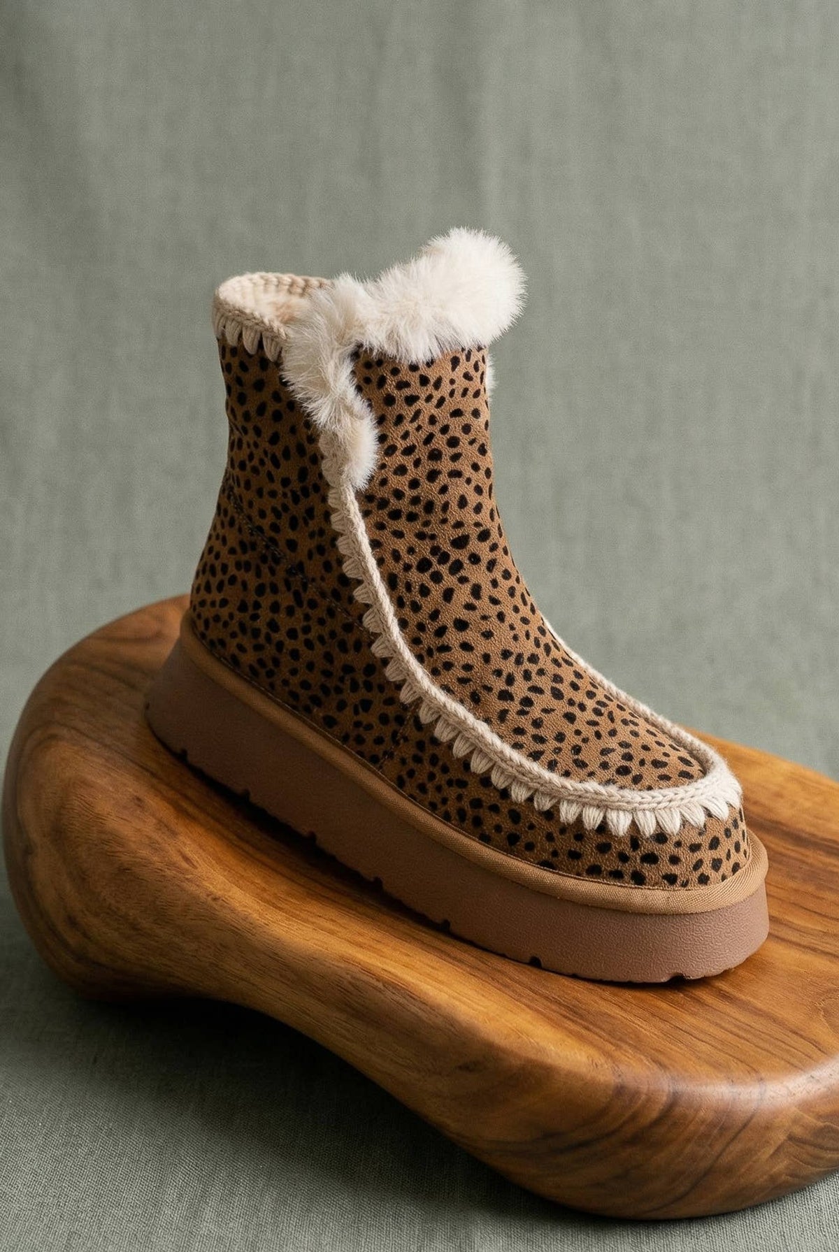 OASIS SOCIETY Joyce dark cheetah shearling trim platform winter boot showing the textured cheetah pattern and shearling accents