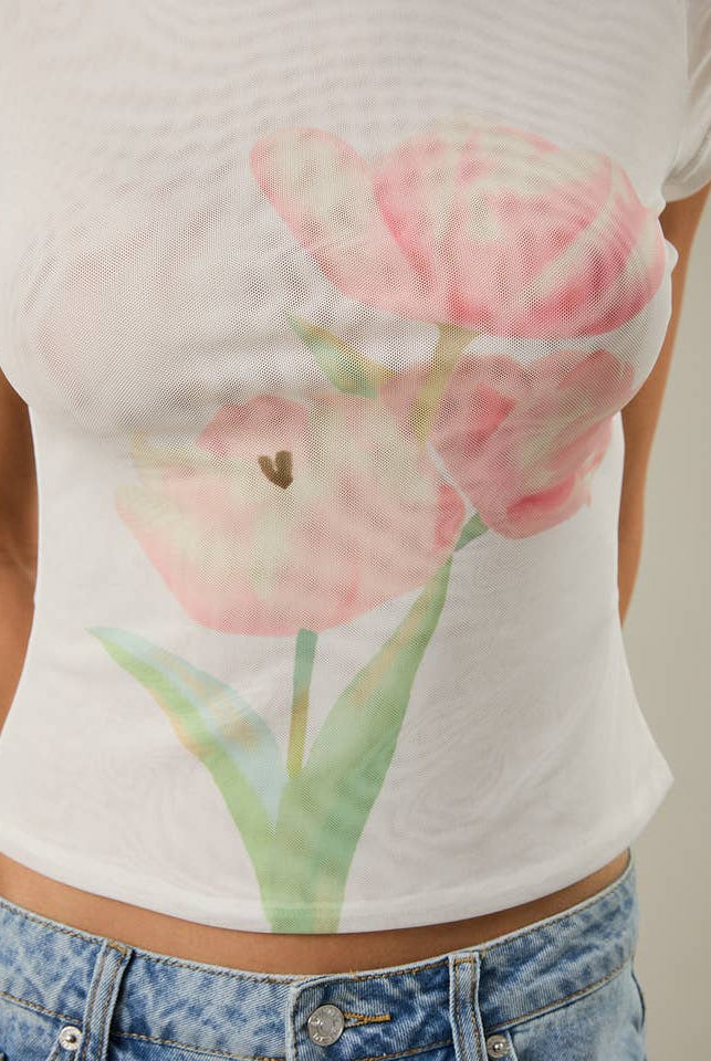 RARA Boutique boat neck floral graphic mesh blouse showing a lightweight, semi-sheer top with floral print and boat neckline.