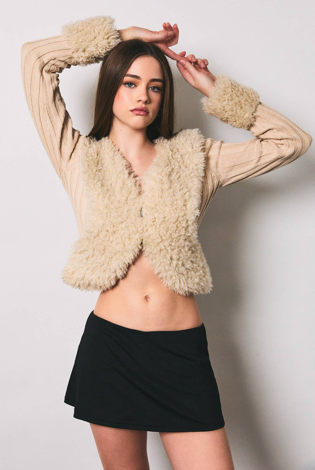 Long sleeve V-neck fur sweater and rib-knit jacket by LE LIS, featuring plush texture and cozy design.