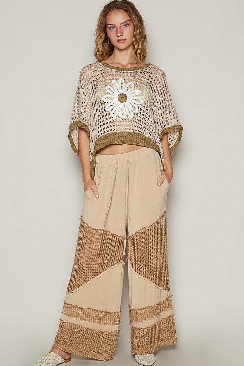 RARA Boutique Daisy Flower open-knit crochet sweater in pastel colors, featuring a floral pattern and relaxed fit.